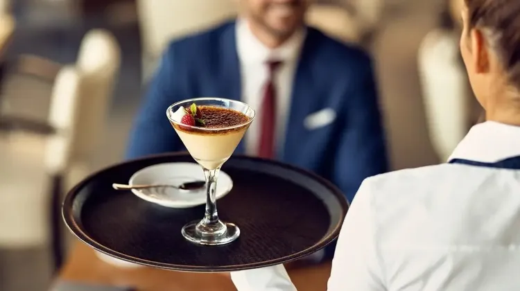 closeup-waitress-serving-dessert-guest-cafe_637285-8889.jpg